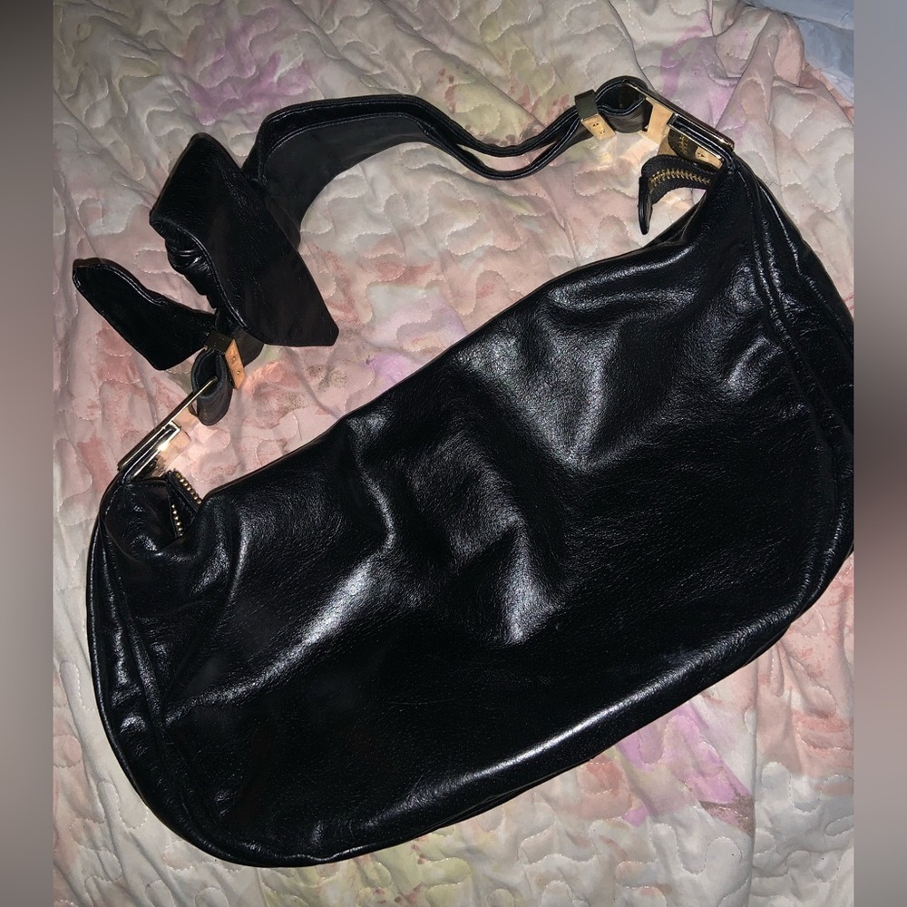 Black badgley Mishka leather boho bow bag purse y2k
Casual fall classic $400 - Picture 6 of 8